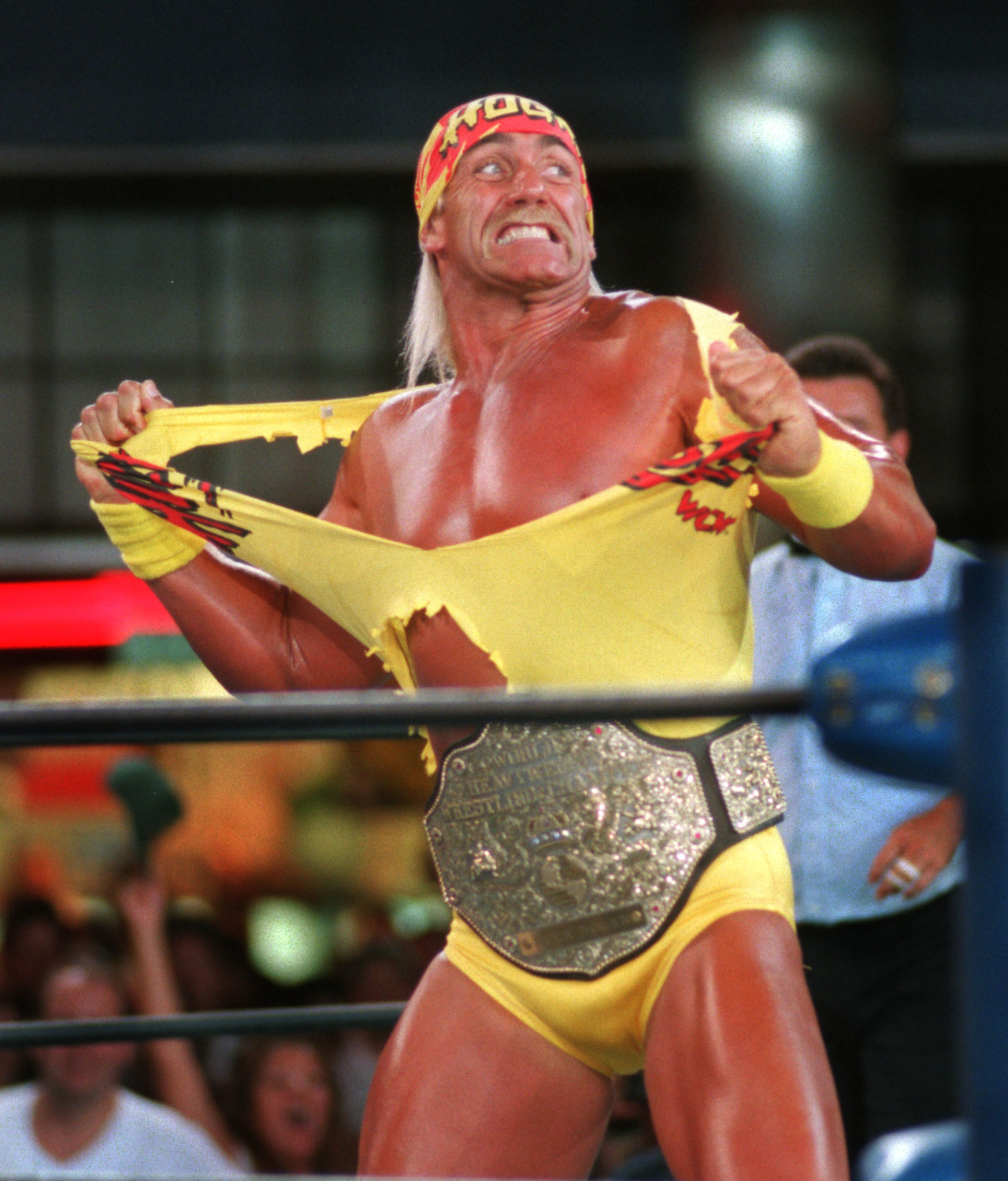 Hulk Hogan tears his shirt off before a match in 1995