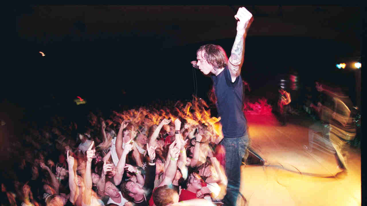 Converge&amp;rsquo;s Jacob Bannon performing onstage in 2001