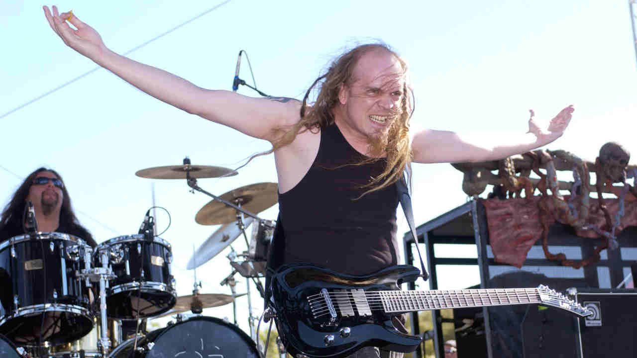 Strapping Young Lad’s Devin Townsend performing onstage in the 2000s