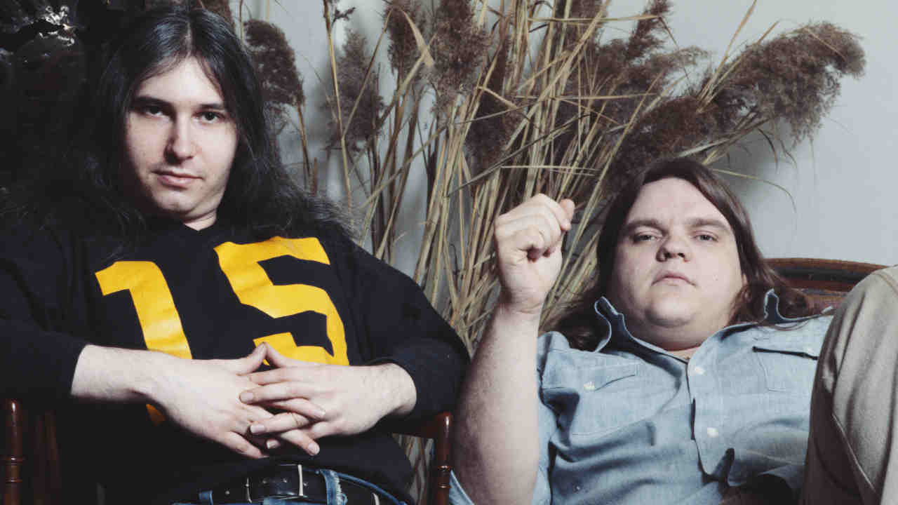Jim Steinman and Meat Loaf posing for a photograph in the late 1970s
