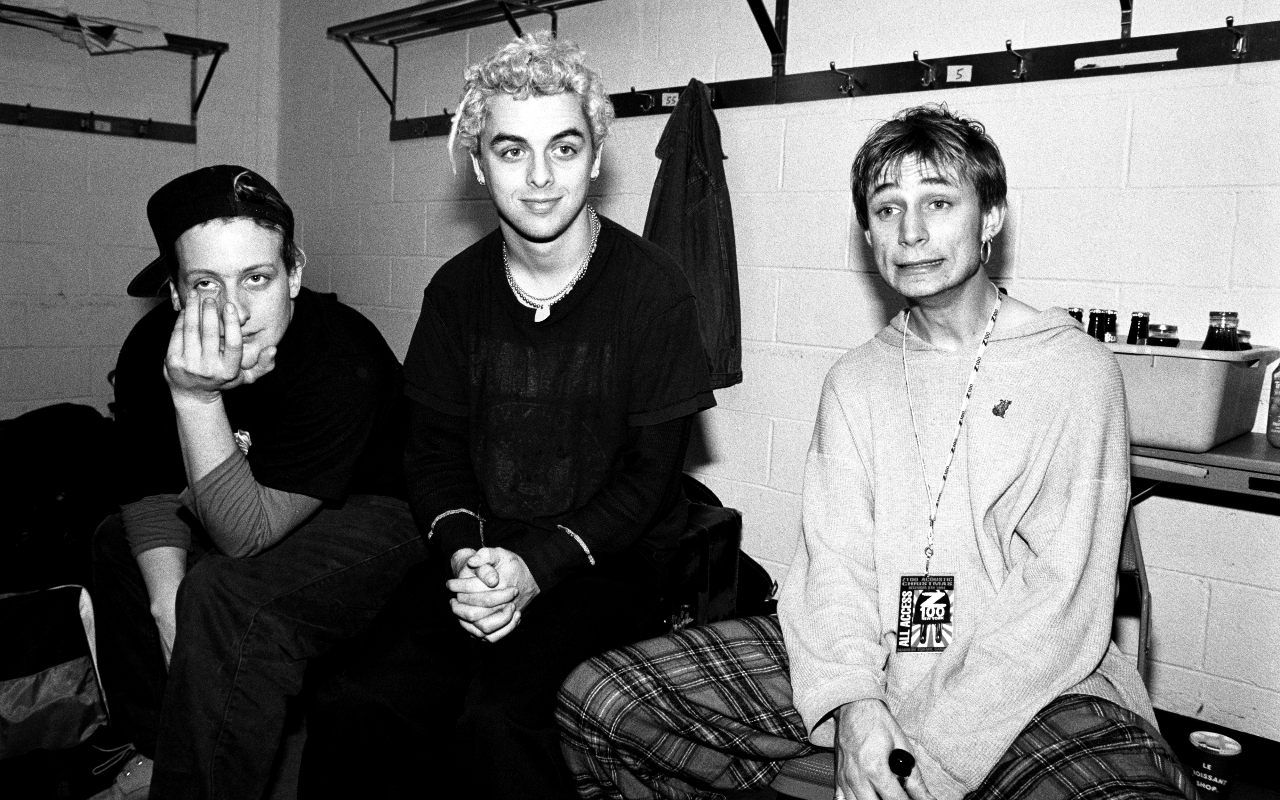 Green Day shot in black and white backstage looking tired