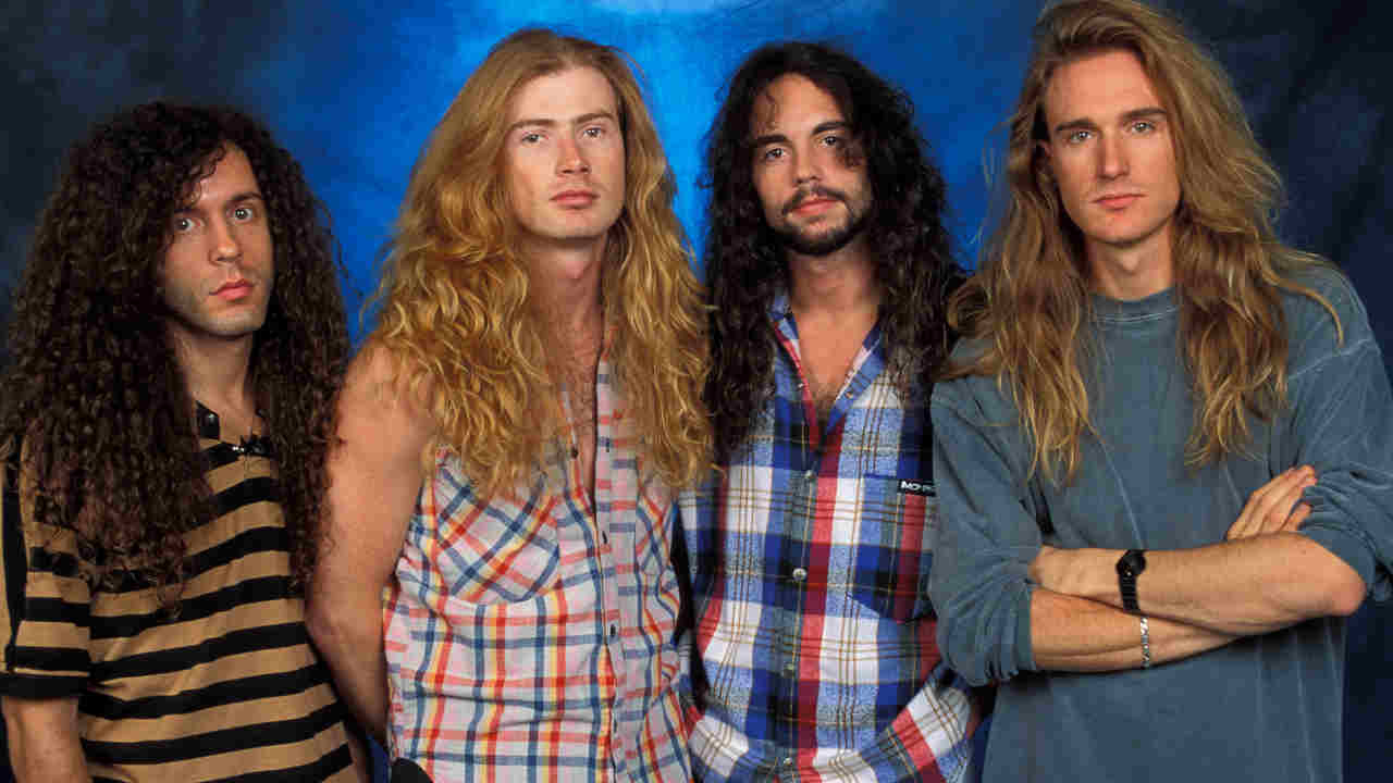 Megadeth posing for a photograph in the early 1990s