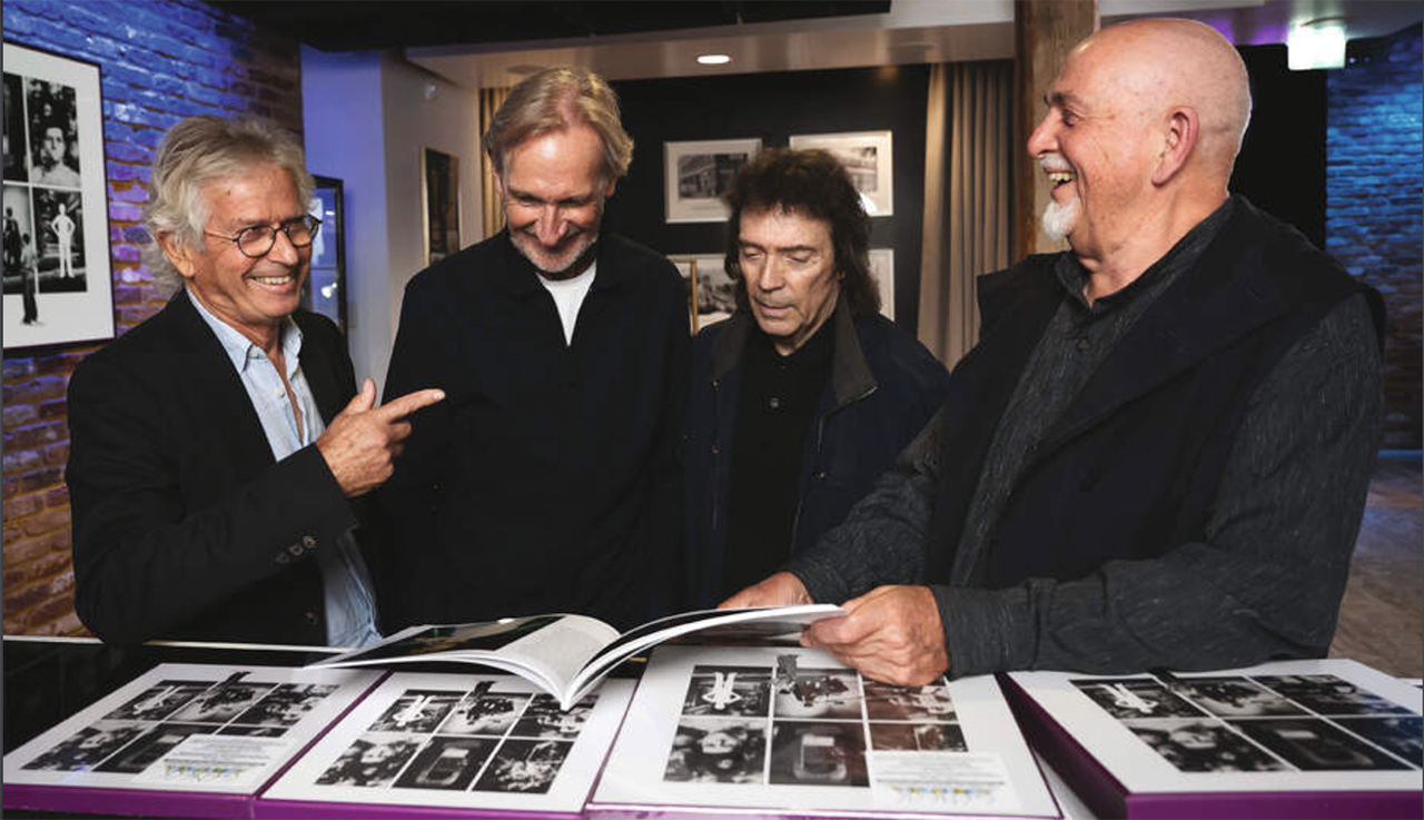 Banks, Rutherford, Hackett and Gabriel checking out the 50th anniversary box set