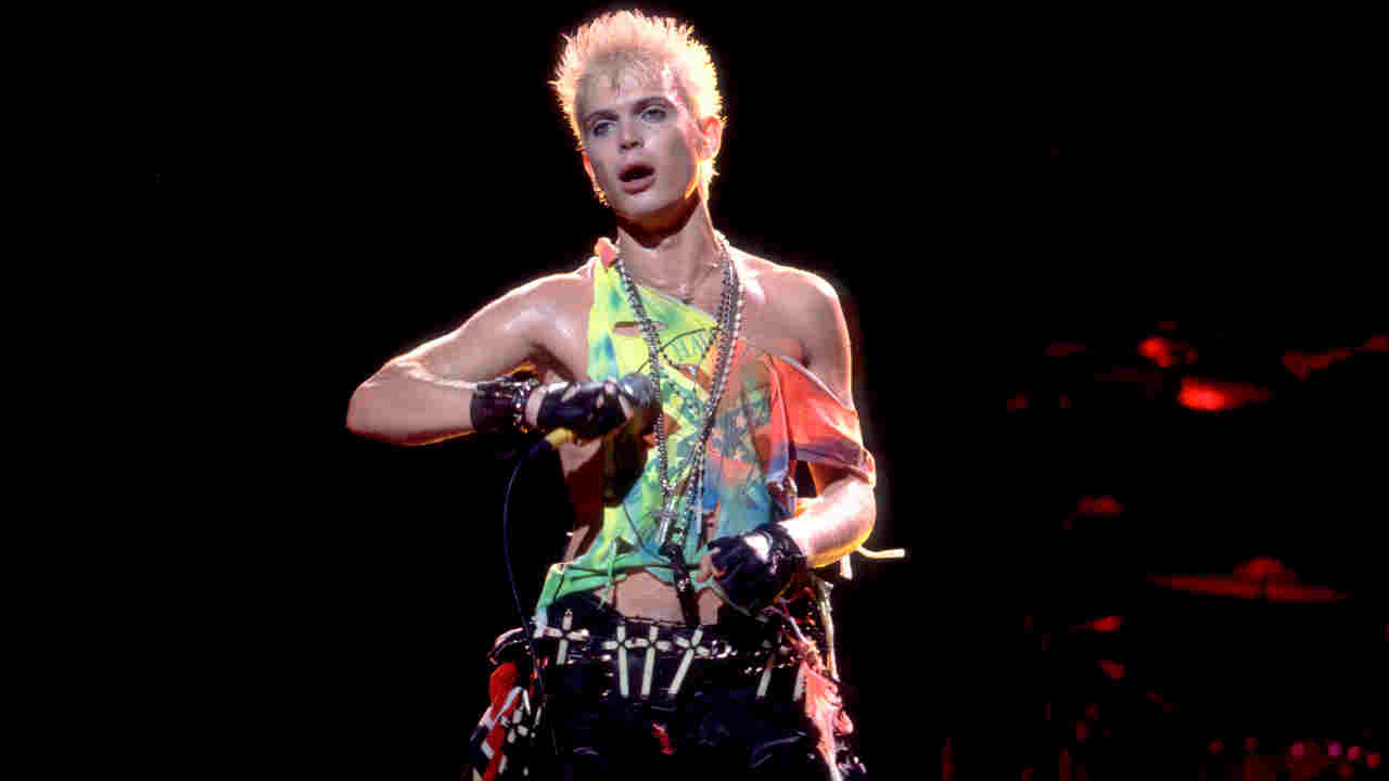 Billy Idol posing for a photograph in the 1980s