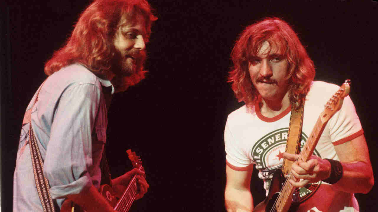 Eagles’ Don Felder and Joe Walsh performing onstage in 1977