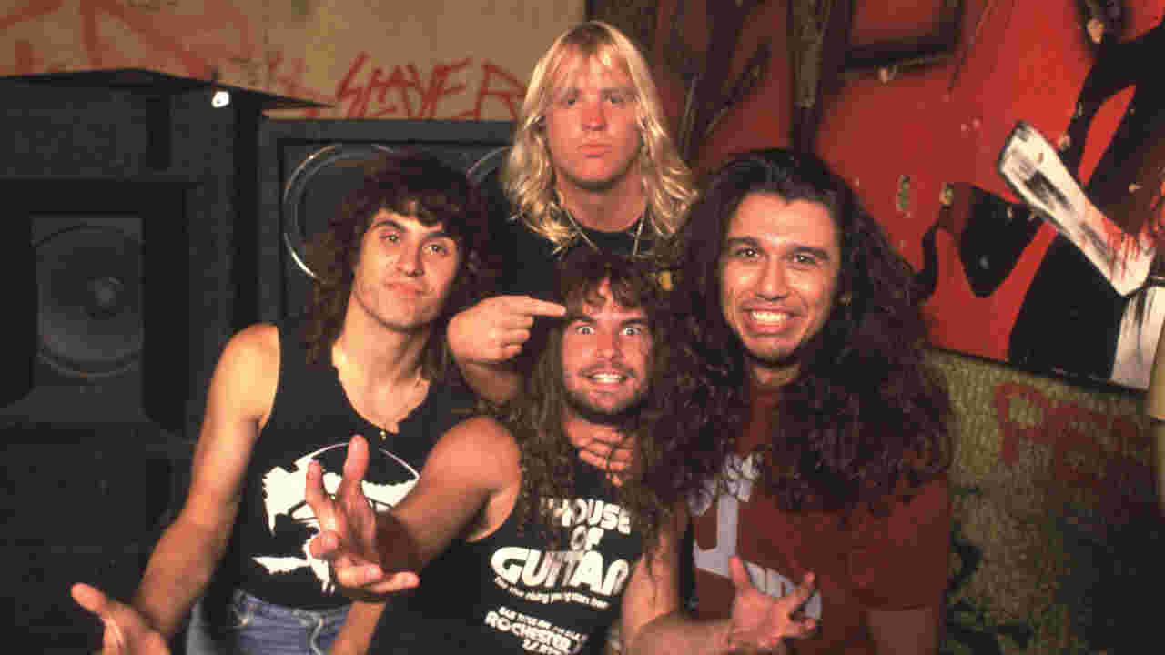 Slayer posing for a photograph in 1986