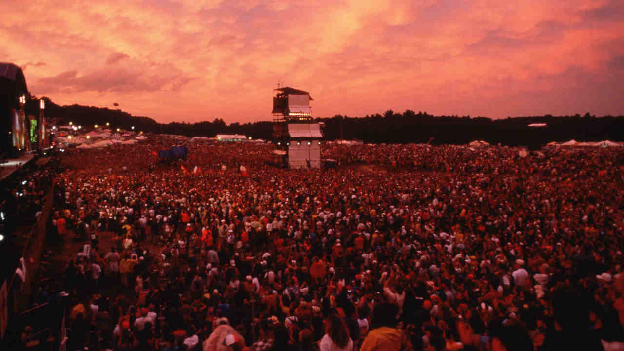 The crowds at Woodstock 94 at sunset