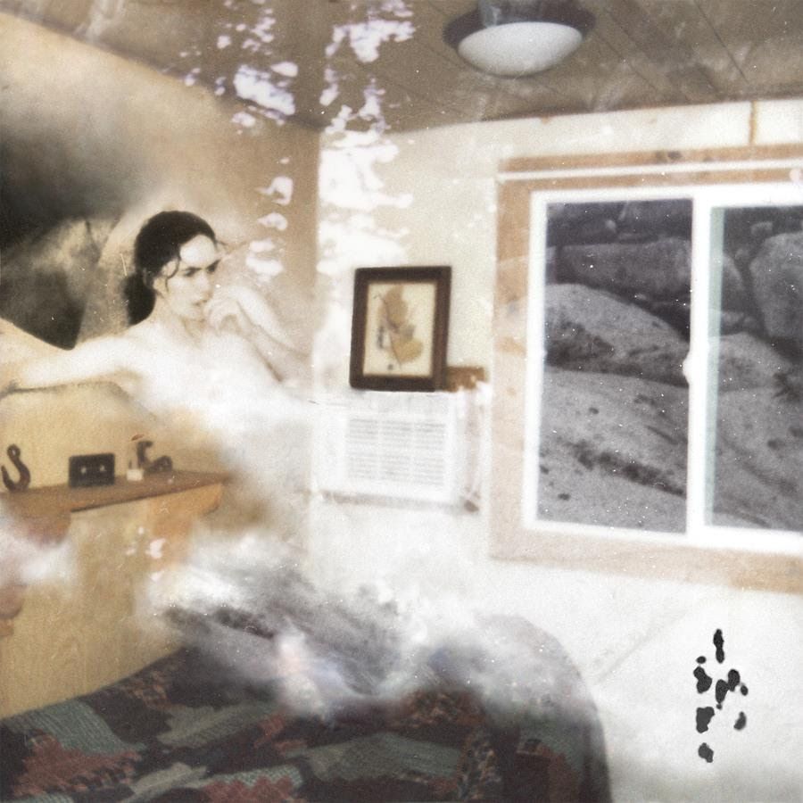 Image may contain Face Head Person Photography Portrait Adult Wedding Indoors Furniture Bed Bedroom and Room