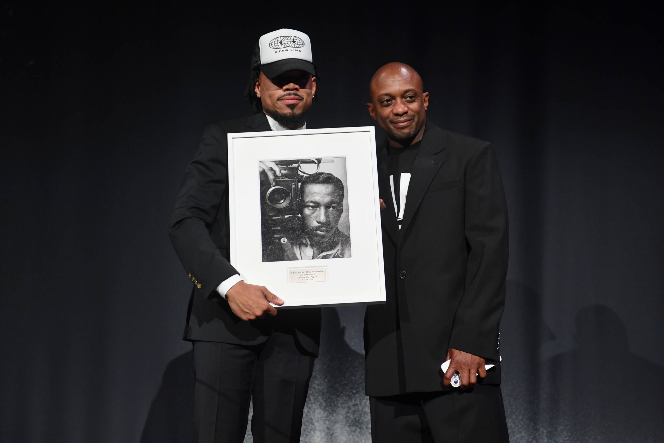 NEW YORK, NEW YORK - MAY 19: Chance The Rapper, and Hank Willis Thomas speak onstage during The Gordon Parks Foundation Awards Dinner and Auction 2026 at Cipriani 42nd Street on May 19, 2026 in New York City.  (Photo by Noam Galai/Getty Images for The Gordon Parks Foundation)