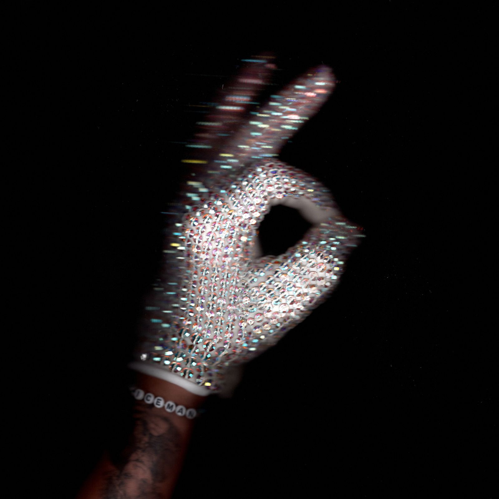 Image may contain Body Part Finger Hand Person Clothing Glove Arm and Adult