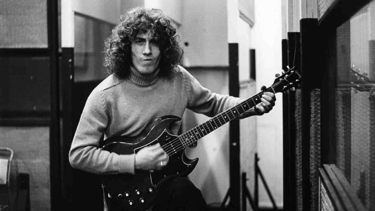 The Who&amp;rsquo;s Roger Daltrey holding a guitar in the studio in the early 1970s