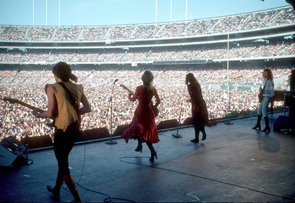Heart onstage at the Oakland Coliseum in 1977, short from the side of the stage