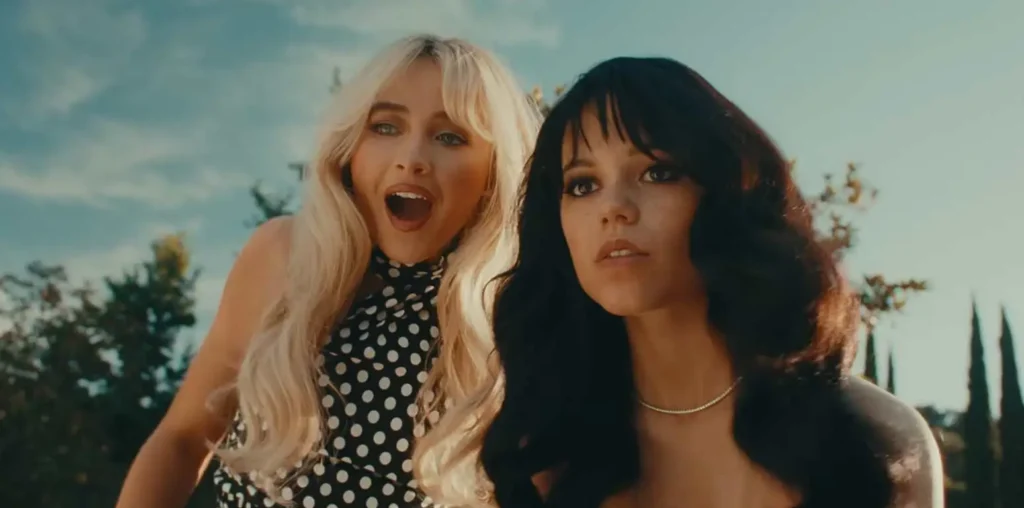 Jenna Ortega Recalls the ‘Espresso’-Inspired Name for the Chainsaw in Sabrina Carpenter’s ‘Taste’ Video 2 Sabrina Carpenter Taste screenshot billboard 1548