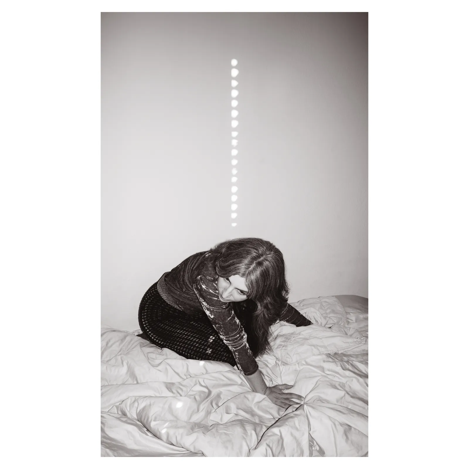 14 New Albums You Should Listen to Now: Lambchop, Julia Holter, and More 15 Image may contain Julia Holter Photography Adult Person Face Head Portrait Bed Furniture Bedroom Indoors and Room