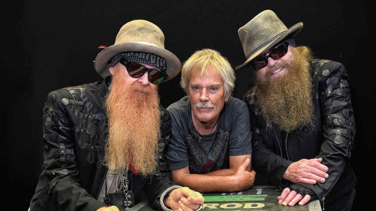 ZZ Top posing for a photograph in 2016