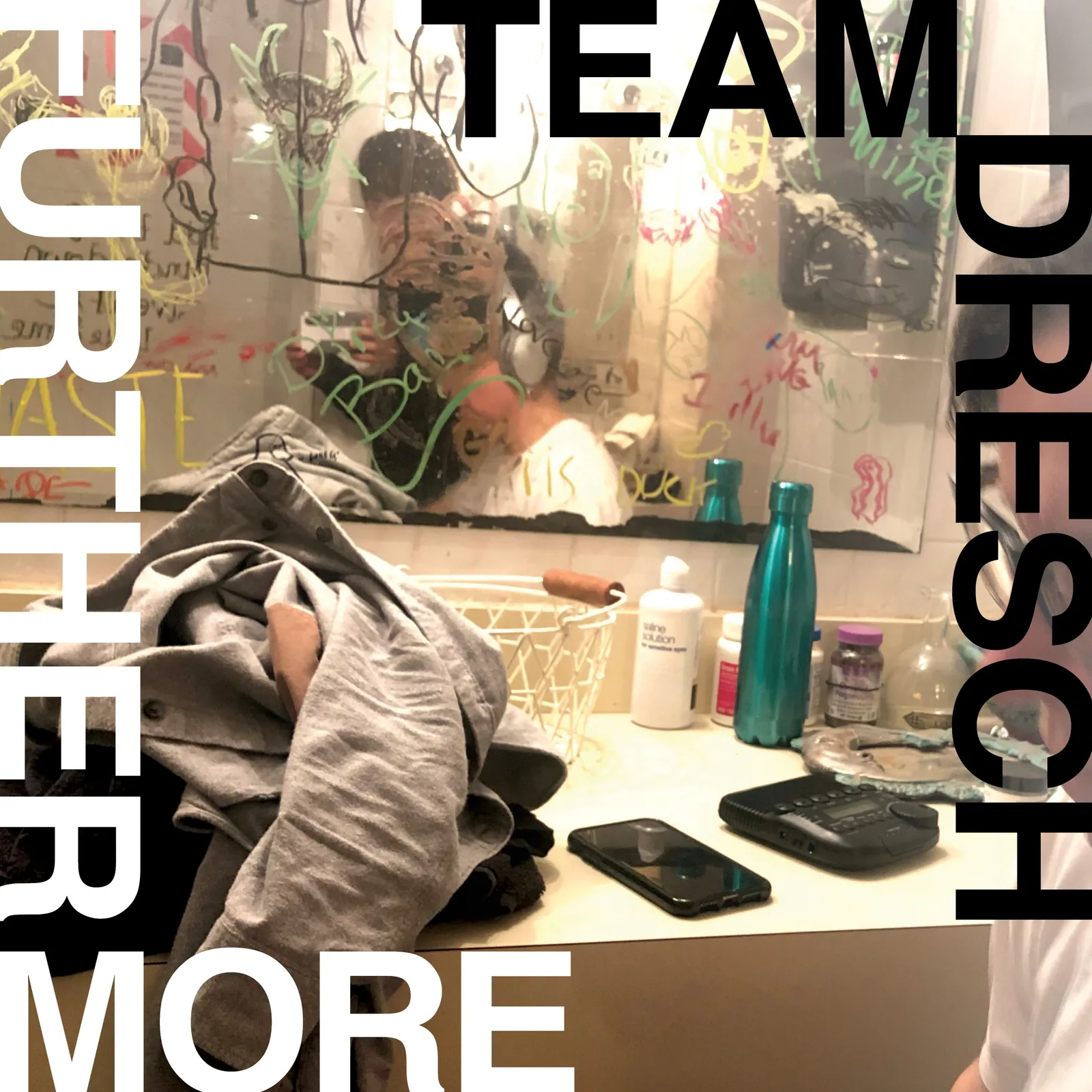 Image may contain Dressing Room Indoors Room Electronics Mobile Phone Phone Adult Person and Wedding