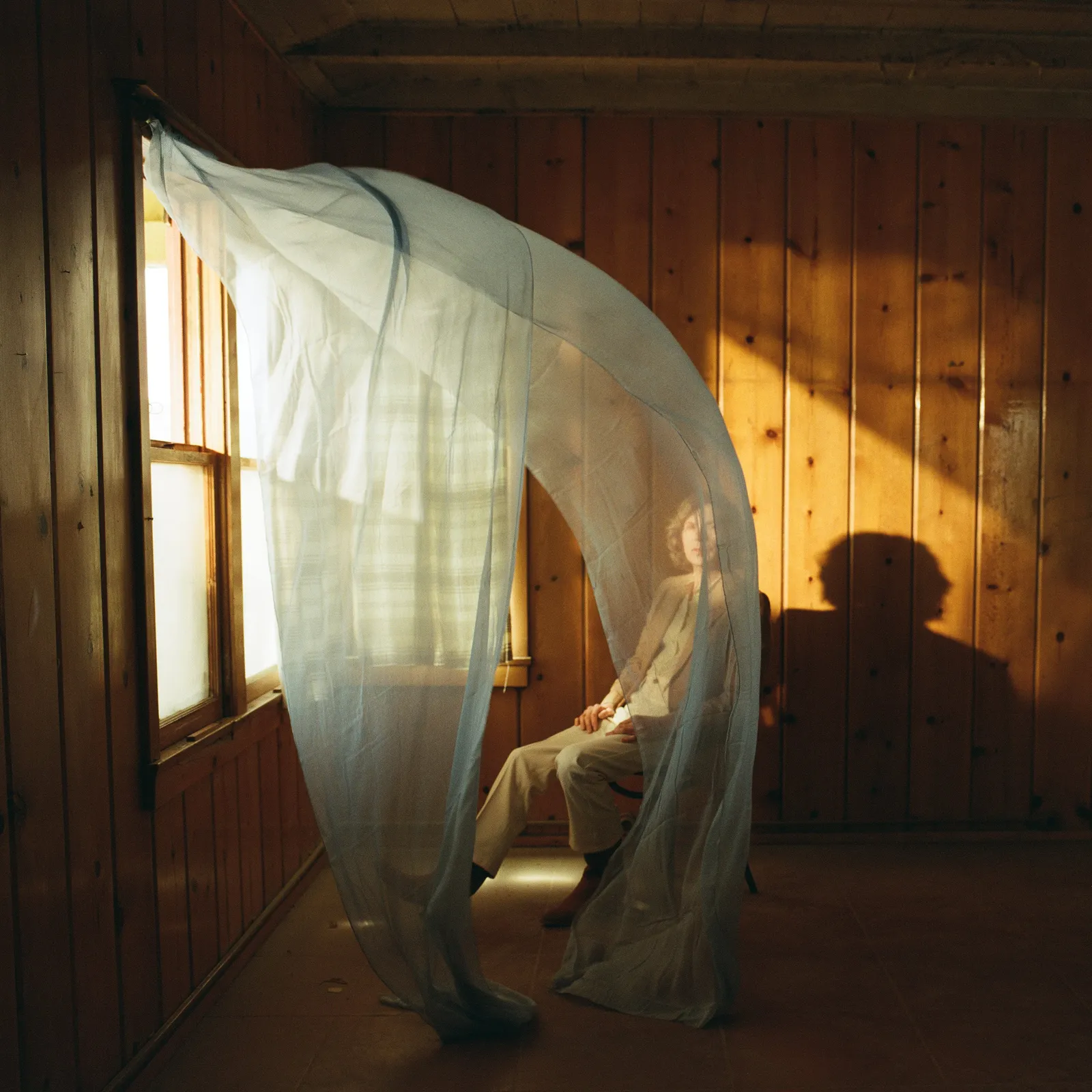 Image may contain Beck Furniture Indoors Bed Bedroom Room Adult Person Wedding Mosquito Net Clothing and Footwear
