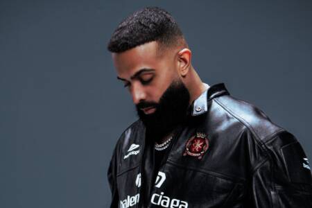 It’s a ‘Polaroid’ Moment for Eladio Carrión With Second Latin Airplay No. 1