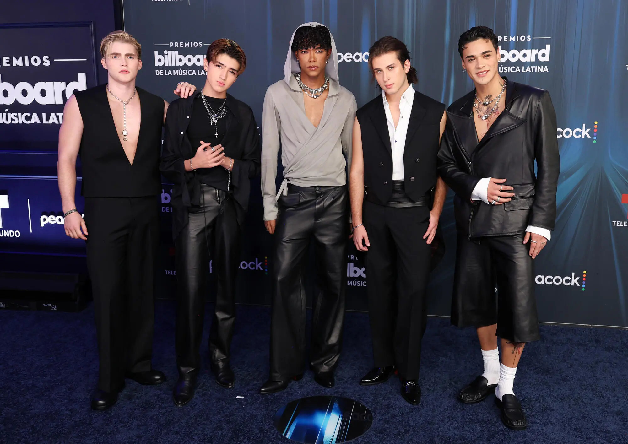 Alejandro Gabriel Berm&uacute;dez, Kenneth Lav&iacute;ll, Kau&ecirc; Penna, Alejandro Aramburu and Drew Venegas of Santos Bravos at the 2026 Billboard Latin Music Awards held at James L. Knight Center on October 22, 2026 in Miami, Florida.