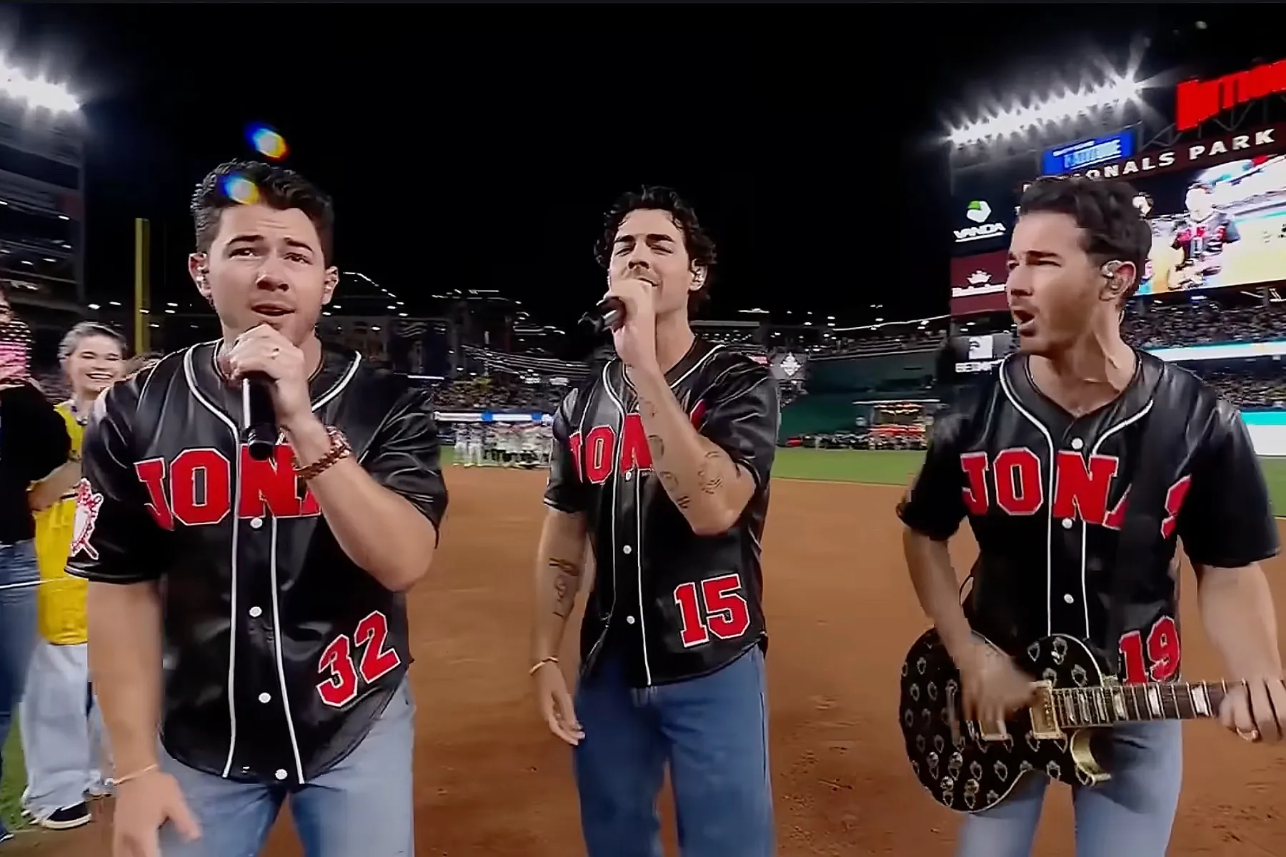 Jonas Brothers Barely Audible Over Screaming Fans During Spirited Banana Bowl 9th Inning Performance 3 image
